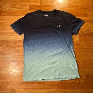 Dark to light blue fading a Hollister T-shirt